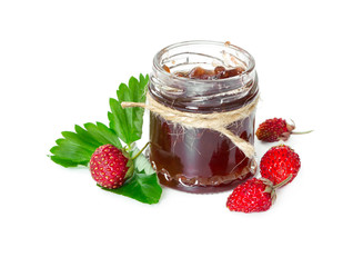 Jam made from wild strawberries in glass jar