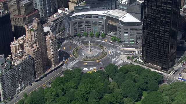 Flight circling New York's Columbus Circle with Time Warner Center in background. Shot in 2006.