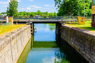 Fototapeta premium Closed swing bridge over Gota canal as seen from the canal at Norsholm, Sweden.