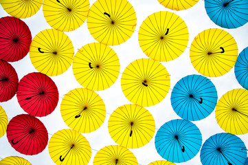 Fototapeta na wymiar different colors umbrellas background