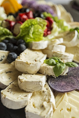 Soft cheese platter garnished for catering
