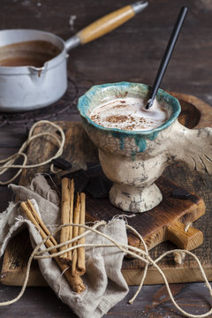 Hot cocoa with cream and cinnamon