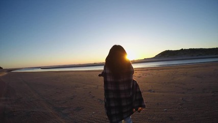 Woman on beach - Powered by Adobe