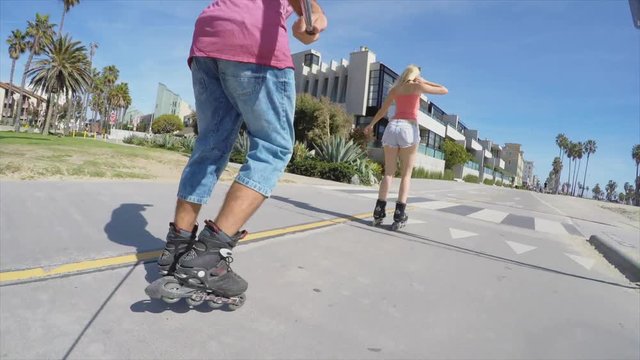 Couple roller skating