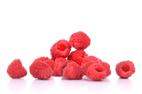 fresh organic raspberries isolated on white background 