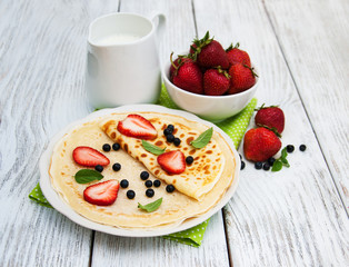 crepes with strawberries and blueberries