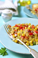 Quinoa salad with bell pepper,tomatoes,red onion,sweet corn and