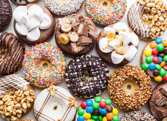 Close up of a selection of colorful donuts.