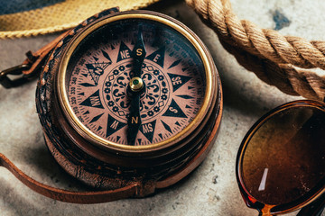 Compass on a gray gradient background