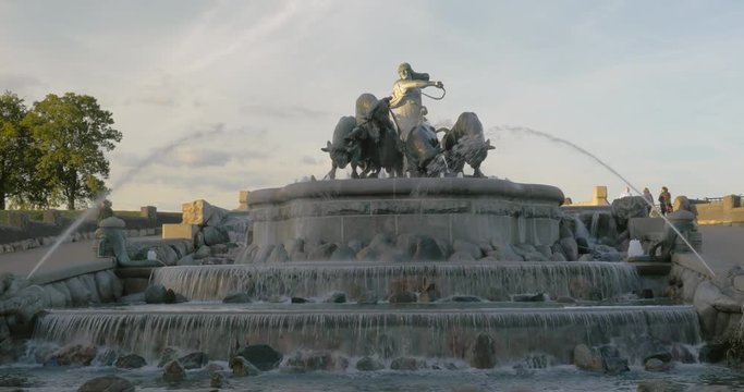 View to the grand Gefion Fountain, landmark of Copenhagen, Denmark. Sculpture of Norse goddess Gefjun with bulls on the top