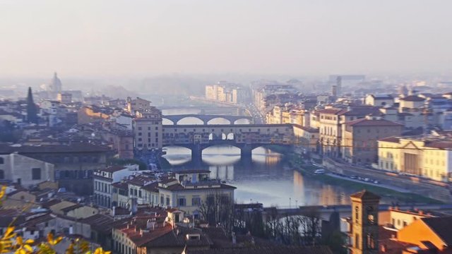 florence italy ponte vecchio zoom out on sunset