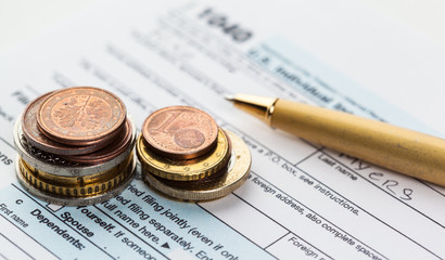 Graph Of Stock Market With Stacks Of Coins