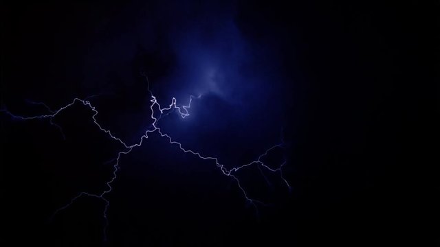Lightning effects in thin clouds on dark blue background