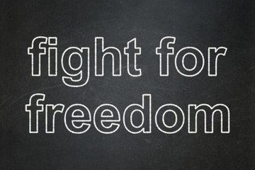 Fototapeta premium Political concept: Fight For Freedom on chalkboard background