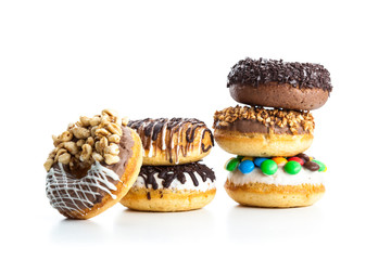 various donuts on white background