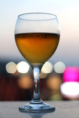Cold beer in a glass. Selective focus with beautiful bokeh.