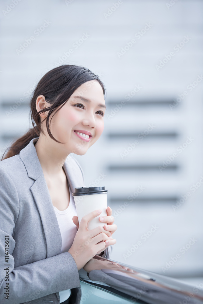 Wall mural business woman with coffee cup