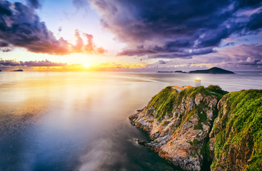 Fototapeta na wymiar Hong Kong lighthouse during sunrise