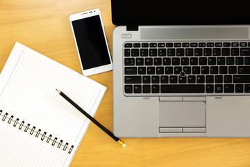 Top view of office Table top with laptop computer, mobile smartp
