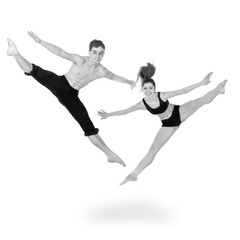 Fototapeta na wymiar colorless portrait of couple man and woman jumping on white background