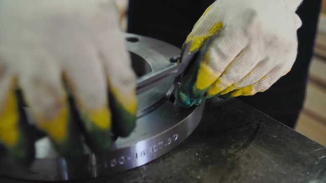 Worker Measures The Diameter with The Flange Caliper