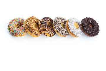 various donuts on white background