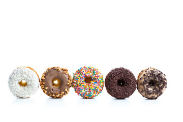 various donuts on white background