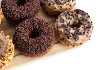 Donuts on wood plate