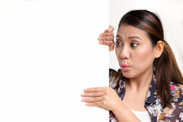 Asian woman holding a blank billboard.