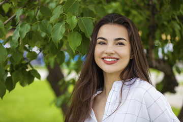 Fototapeta premium Portrait of beautiful young happy woman
