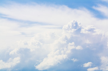 Fototapeta premium over clouds