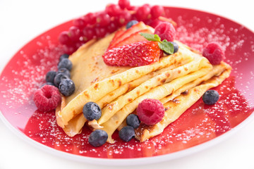 crepe with sugar and berry