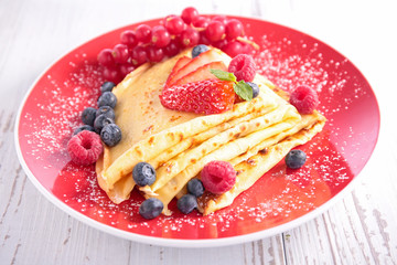 crepe with sugar and berry