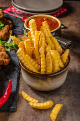 Schnitzel with fries, salad and herbs