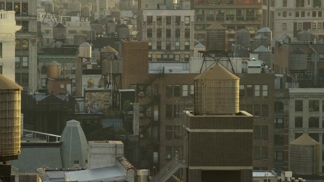 Wide shot of highrise buildings in cityscape / New York, New York, United States