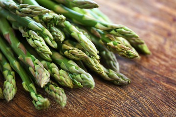 Asparagus on wooden table