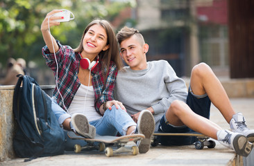 friends taking picture for selfie
