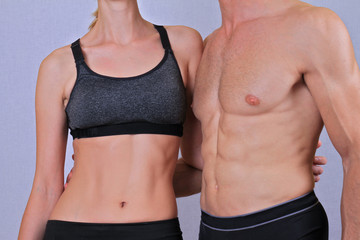 Fit couple, strong muscular man and slim woman . Sport, fitness ,workout concept. Love,...