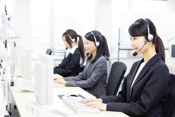 asian operator working in office