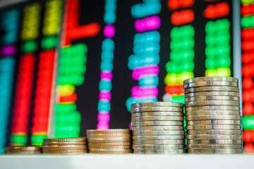 Money coins and Stock market.