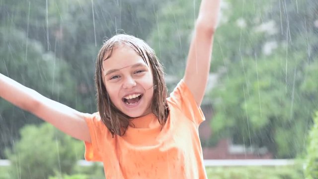 Girl playing in rain