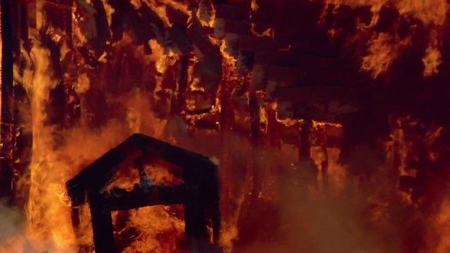 Fallen gable silhouetted against burning ruins of house