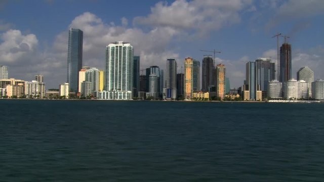 Low flight past Miami skyscrapers along Biscayne Bay. Shot in 2007.