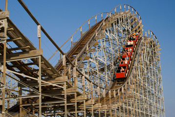 Old wooden rollercoaster at an amusement park