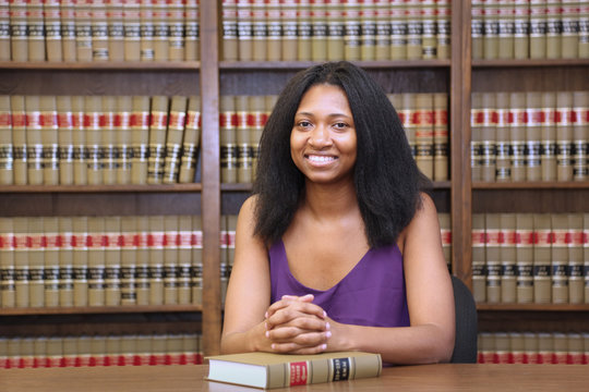 Women's rights, young female African American law student, women in law, law office
