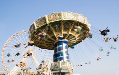 Ferris-wheel and chain swing ride at an amusement park