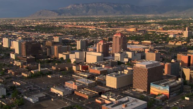 Flying past downtown Albuquerque with Sandia Mountains in background. Shot in 2008.