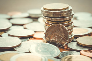 business finance. save money for investment concept coins with f