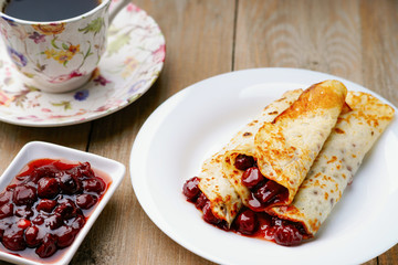 Pancakes, jam and coffee