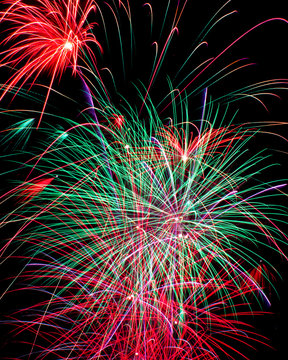 Fireworks explosions in the night sky
